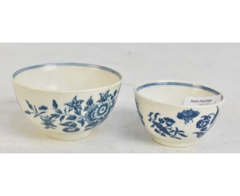 WORCESTER; a Dr Wall period tea bowl decorated in the 'Three Flowers' pattern circa 1775, diameter 8cm, and a smaller example