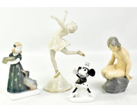 Four ceramic figures comprising Royal Copenhagen 4027 girl on rock, Rosenthal 256, 653 Minnie Mouse (af) and Metzler &amp; Or