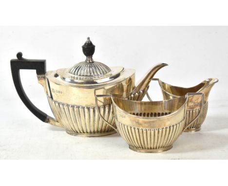 JOHN ROSE; a Victorian hallmarked silver bachelor's tea set comprising teapot with ebonised handle and finial, length 21cm, t