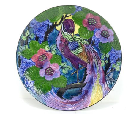 An Art Deco tubeline decorated charger, signed R. Dean, diameter 34.5cm.