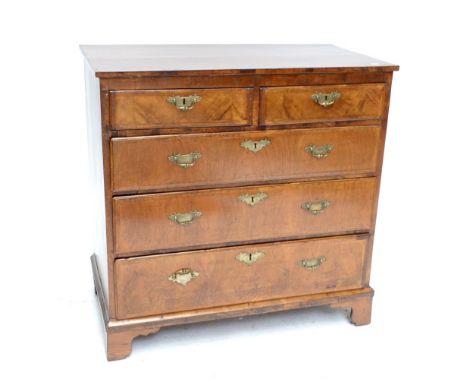 A George III chest of two over three drawers on ogee bracket feet, 94 x 94cm.