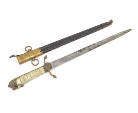 A Victorian Naval dirk with shagreen grip, lion's head pommel, acorn tips to the crossguard and with engraving to the blade a