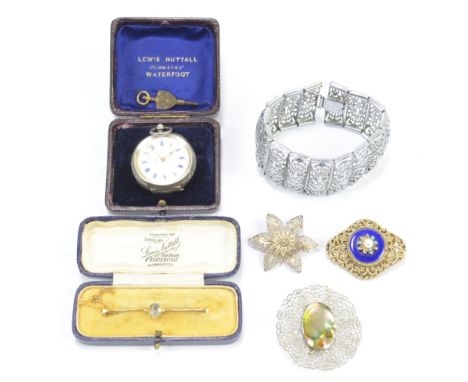 A small group of jewellery comprising yellow metal bar brooch set with oval cut light blue coloured stone with indistinct mar