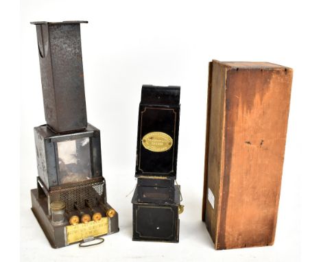 A 19th/20th century four wick Stocks-Wrench lamp for a Magic Lantern, height 35cm, also a Wilkinson &amp; Co Magic Lantern le