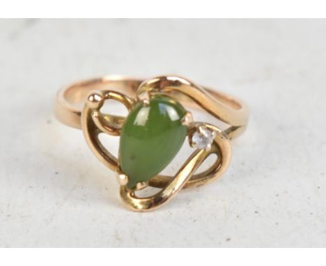 A 14ct yellow gold jade ring in pierced openwork frame, size M1/2, approx 3.1g.
