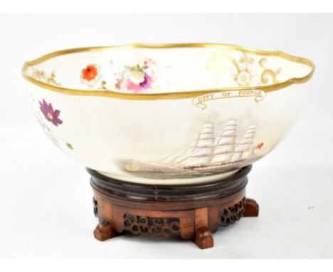 A 19th century hand painted ceramic bowl of circular form, painted with floral sprays and gilt motifs and three masted naval 