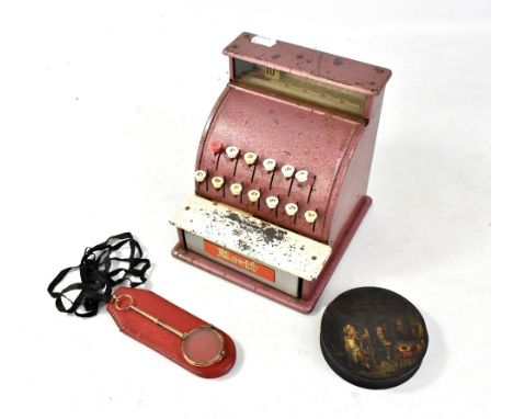 A pair of cased gold plated lorgnettes, a child's Merit toy cash register and a black lacquered snuff box (3).