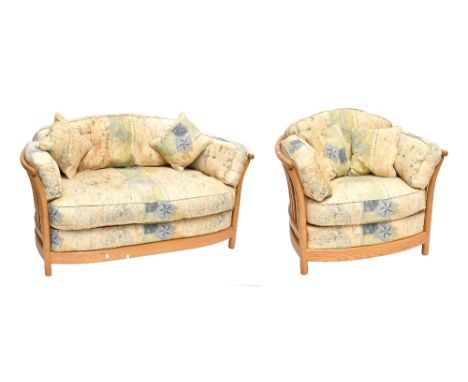 ERCOL; a splat back two seater sofa and armchair with detachable cushions, length 142cm.