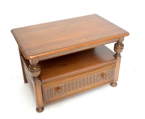 ERCOL; a 'Golden Dawn' television stand, with rounded rectangular top above single drawer, width 73cm.