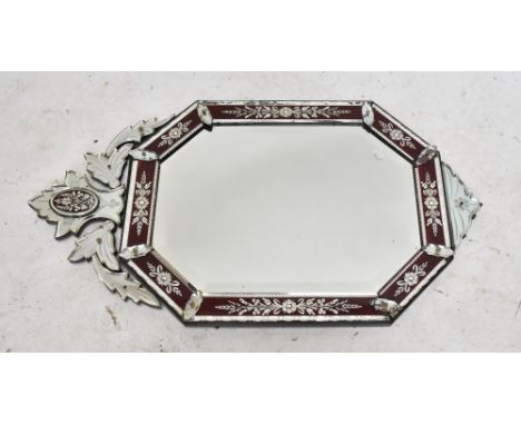 A Venetian shaped wall mirror with ruby effect panels, floral etched detail and applied shaped panels, length 97cm, width 52.