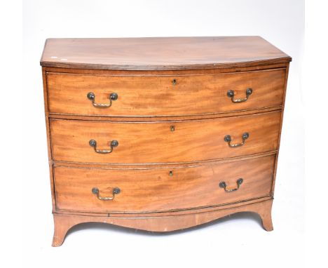 An early 19th century mahogany bowfronted chest of three long graduated drawers raised on splayed bracket feet, width 108cm.