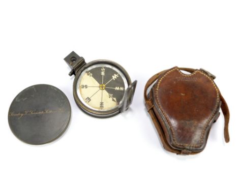 STANLEY; a leather cased brass circular pocket compass with paper dial, the cap inscribed 'Stanley Gt. Turnstile, Holborne, L