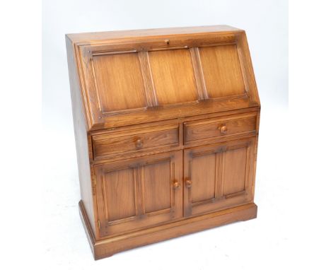 ERCOL; a 'Golden Dawn' bureau with fitted interior above two drawers and two cupboard doors, width 93.5cm.