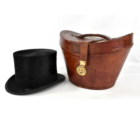 WOODROW OF LIVERPOOL; a black top hat with manufacturer's stamp to silk lined interior, aperture 20.5 x 16.5cm, housed in lea