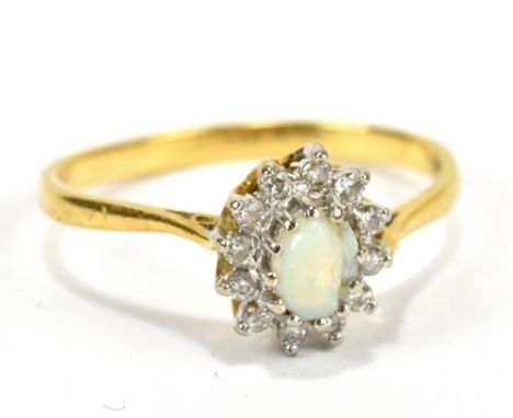 An 18ct yellow gold, opal and diamond dress ring, size P, approx 2.9g (opal af).Additional InformationOpal has been chipped w