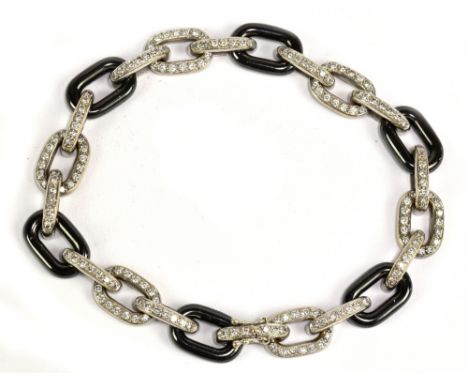 An 18ct white gold black ceramic and diamond set link bracelet, the frame set with 176 diamonds, length 20.5cm, approx 29g.