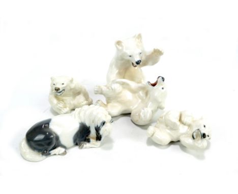 ROYAL COPENHAGEN; four figure groups to include two polar bears fighting, two further and a horse.Additional InformationSilve