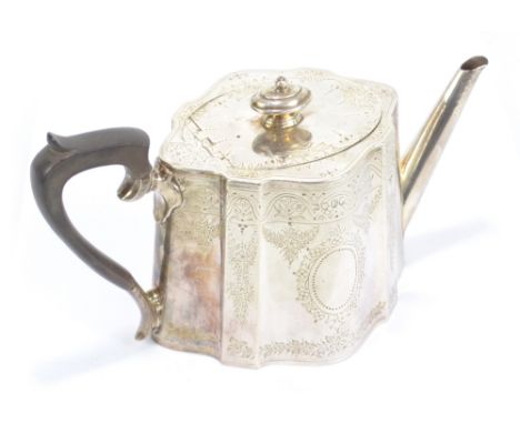 WILLIAM HUTTON &amp; SONS; a hallmarked silver teapot of oval form with chased floral decoration and two vacant cartouches, L