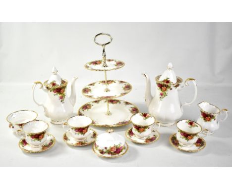 ROYAL ALBERT; a 'Old Country Roses' dinner set to include cups and saucers, side plates, tureen lacking cover, cake stand, te