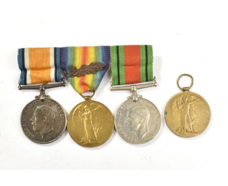 A WWI and WWII group of three, the War and Victory Medals awarded to 5824 Pte. R.J. West 24-Lond. R. with WWII Defence Medal 