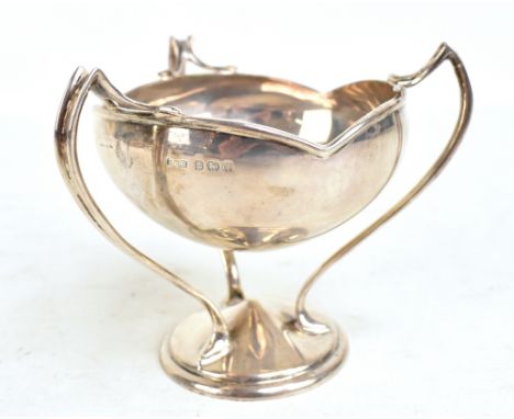 An Edwardian Art Nouveau hallmarked silver three handled trophy cup inscribed 'Chorlton-C-Hardy Golf Club Autumn Meeting Best