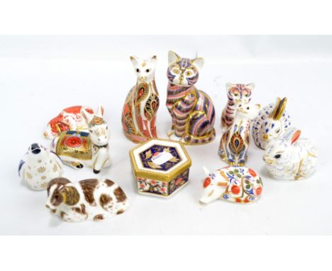 ROYAL CROWN DERBY; a group of animal paperweights to include cats, rabbits, a donkey foal, etc, and a hexagonal box with cove