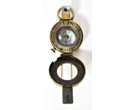 TG &amp; CO LTD; a WWII military issue brass pocket compass, no.216643 and inscribed '1943, MKIII', uncased, diameter approx 