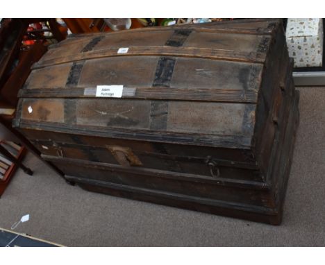 An iron bound dome topped travelling trunk, width approx 93cm, also a copper coal scuttle and irons.