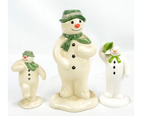 ROYAL DOULTON; a ceramic 'The Snowman' money box, a small figurine example dancing, a Coalport example.