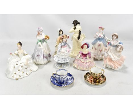 Eight ceramic figures including two Royal Doulton examples, 'Evelyn' and 'My Love' with further Coalport, also two Royal Crow