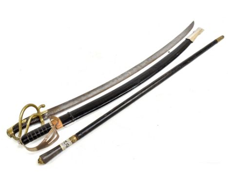 An early 19th century French cavalry sabre indistinctly signed and dated 1836 to blade back with brass guard and ribbed grip,