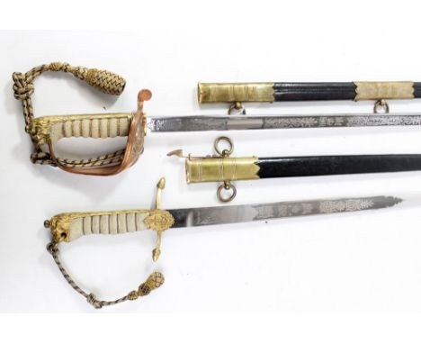 An Elizabeth II Royal Naval dress sword, the blade with etched detail and Wilkinson Sword Co Ltd London mark to base, blade l