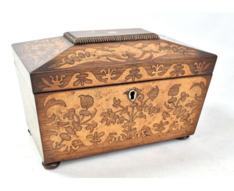 A Victorian rosewood and birdseye maple inlaid two division sarcophagus tea caddy on bun feet, length 23cm.Additional Informa