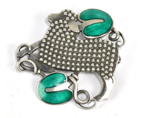 GEORG JENSEN; a silver and enamel brooch designed by Arno Malinowski, model no.284, pierced and cast in low relief with a lam
