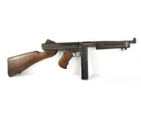A deactivated Thompson machine gun stamped 'Thompson sub-machine gun caliber .45M1A1', Auto-Ordnance Corporation Bridgeport, 