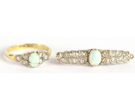 An 18ct yellow gold opal and diamond ring (af), size T, also a matching yellow gold opal and diamond brooch, approx 6.6g.