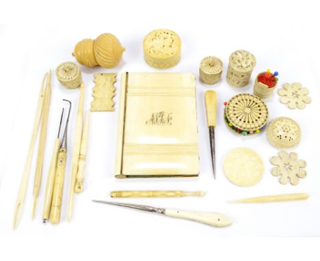 A late 19th century ivory cased notebook, with silver plated propelling pencil, also a small group of ivory and bone sewing t