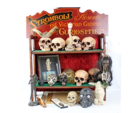 THE GREAT STROMBOLI; the magician's two-tiered stand inscribed 'Stromboli Presents the Victorian Cabinet of Curiosities', app