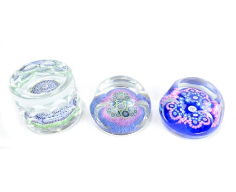 Three Whitefriars glass paperweights, each with faceted decoration, to include a Coronation example, one example complete wit