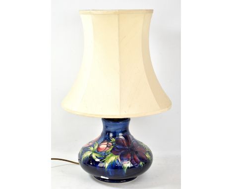 MOORCROFT; a tubeline decorated 'Anemone' pattern squat lamp base on blue ground, impressed marks and year cipher for 1990 to