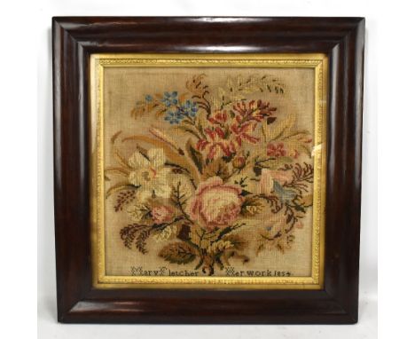 An early Victorian floral sampler signed 'Mary Fletcher Her Work 1854', 42.5 x 43cm, framed and glazed.&nbsp;Additional Infor