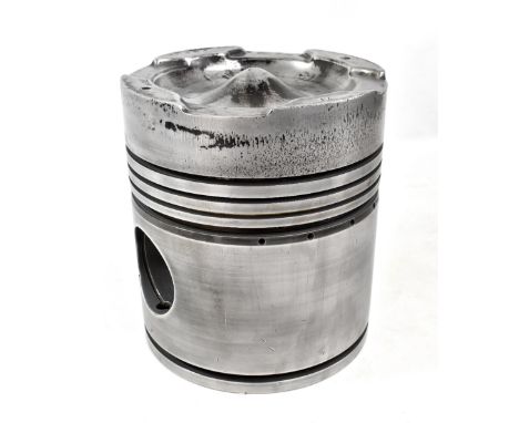 A large aluminium piston from a class 37 diesel engine loco, various stamps to top, 28.5 x 25cm.Additional InformationThis it