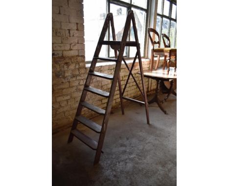 A pair of vintage wooden decorators step ladders. 168CM.