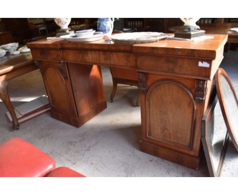 Victorian mahogany inverted breakfront pedestal sideboard,  possibly Scottish, the pedestals with moulded and arched panel do