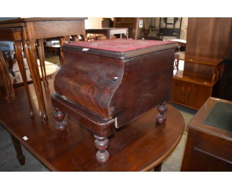 A Victorian mahogany step commode with serpentine front and turned legs. 46CM. X46CM.