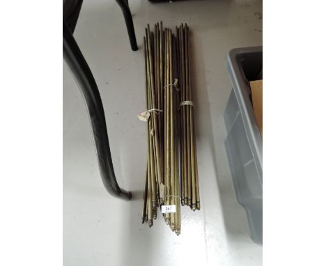 A selection of vintage brass cast stair and carpet rods