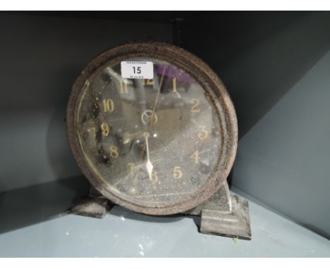 A vintage metal bodied mantle clock