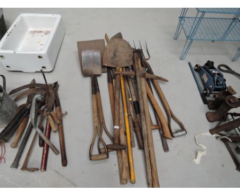 A selection of vintage hand and garden tools