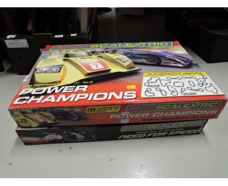 Two childrens slot car racer sets by Scalextric
