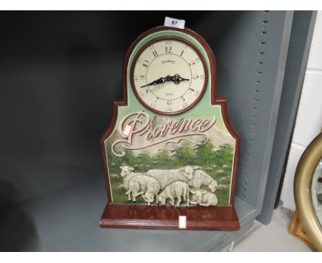 A modern style country and sheep theme wall clock